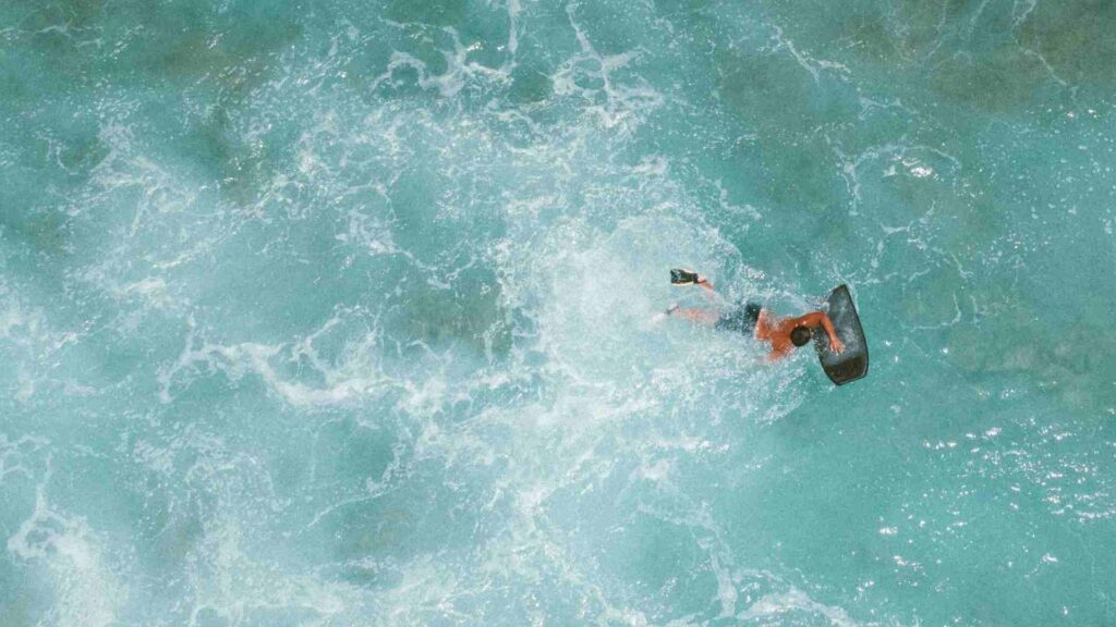 A picture of someone using a floating device in water