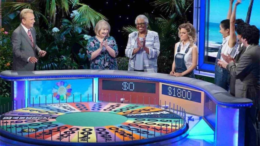 A picture of people playing the wheel of fortune