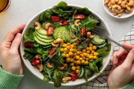 A picture of a person about to eat a high-fiber Fiber Food