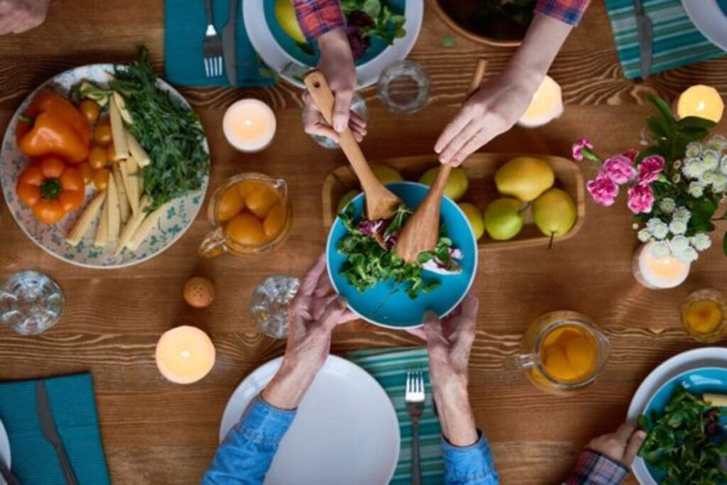 A picture of people eating on a table