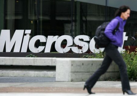 A Man Walking Past Microsoft