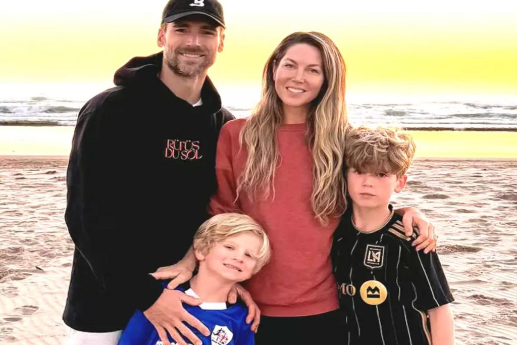 A picture of Andrew Walker, Cassandra Troy and their two sons