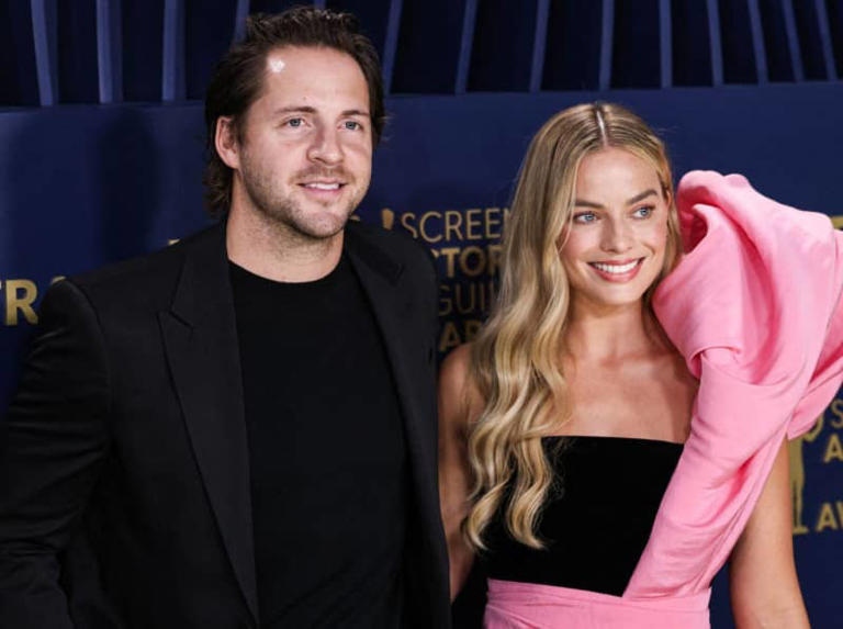 A picture of Margot Robbie and Tom Ackerley