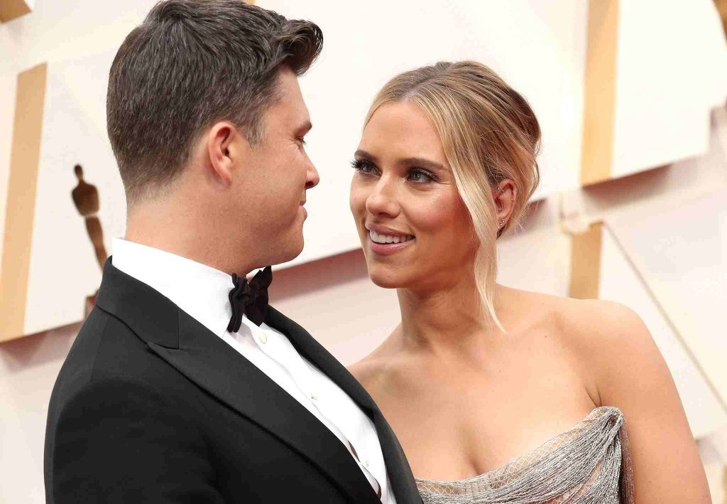 Colin Jost and Scarlett Johanssen on a red carpet