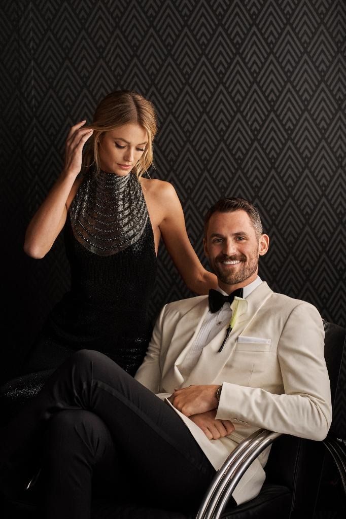 Kate Bock posing with her husband Kevin Love