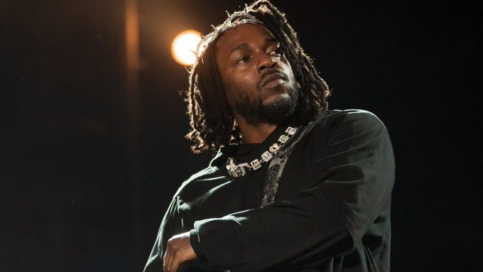 Kendrick Lamar amidst a performance