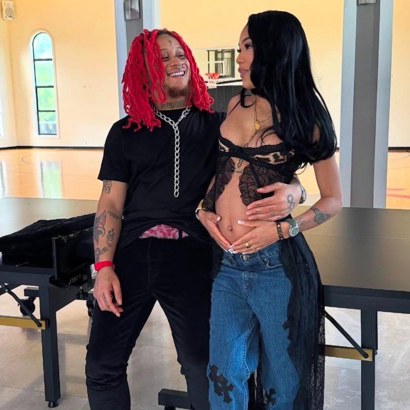 Trippie Redd posing with Coi Leray