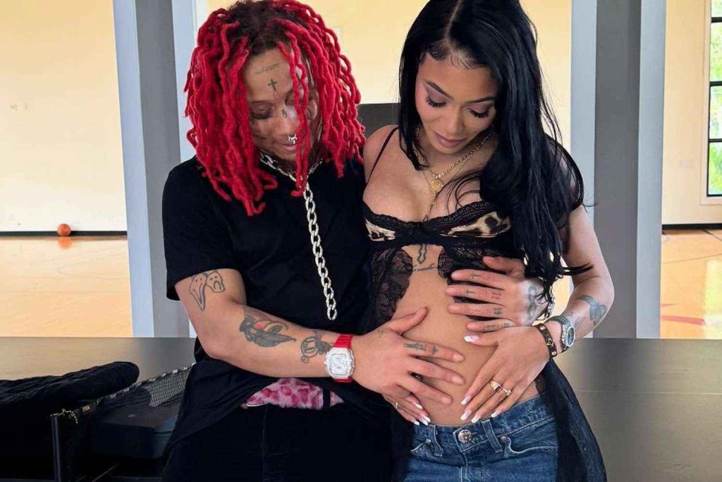 Trippie Redd posing with Coi Leray