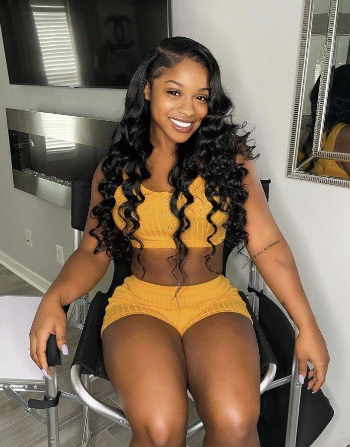 Reginae Carter flashing a smile for the camera 