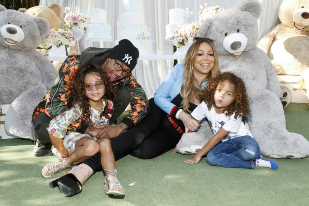 A picture of Nick Cannon and Mariah Carey with Moroccan and Monroe