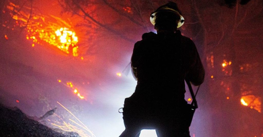 A firefighter battling the blaze in LA 