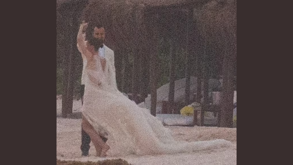 A picture of Justin Theroux and Nicole Brydon Bloom dancing at their Wedding ceremony