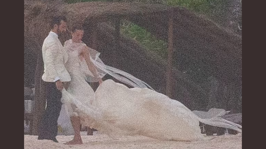 A picture of Justin Theroux and Nicole Brydon Bloom at their wedding